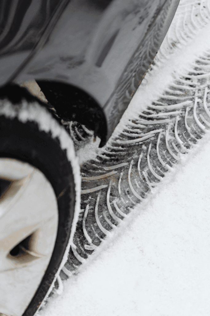 Deep tread of a winter tire in the snow