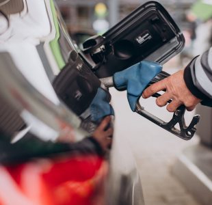 Refueling car at gas station