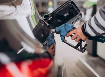 Refueling car at gas station