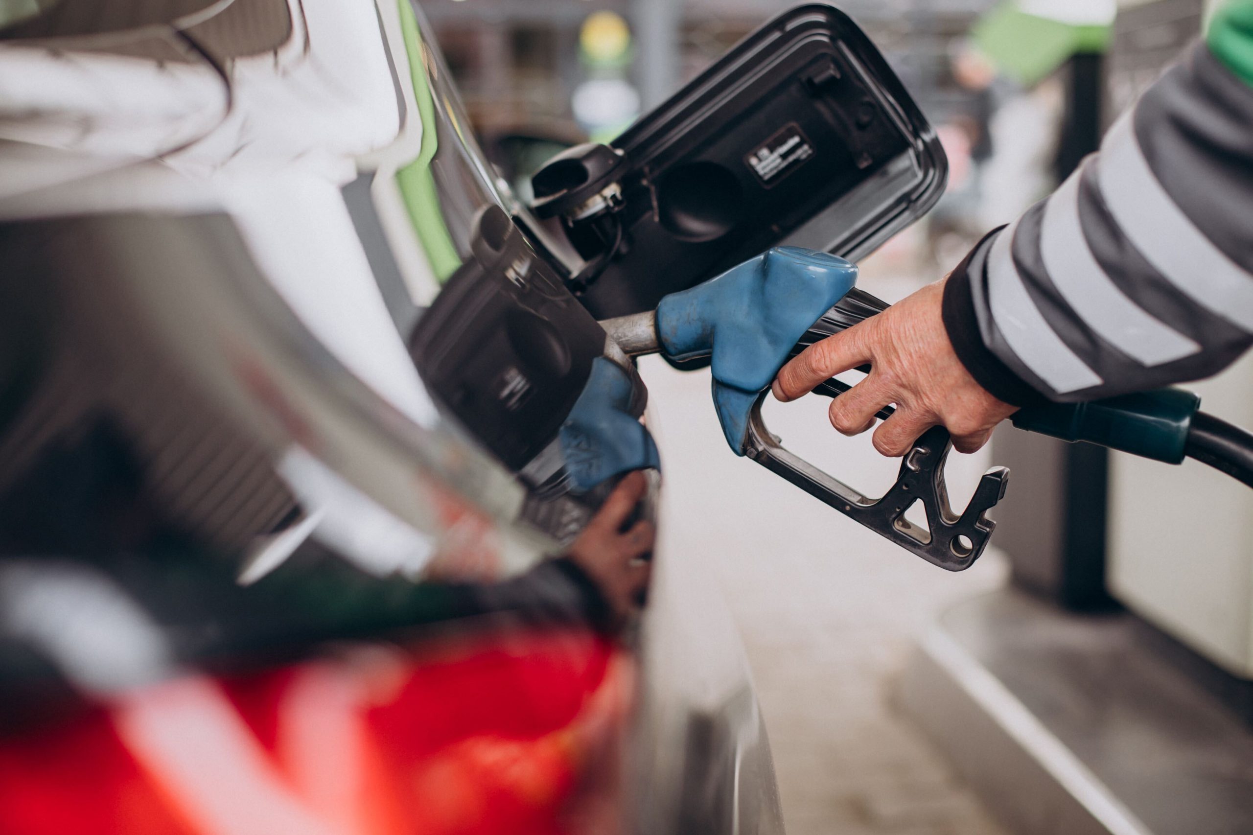 Refueling car at gas station