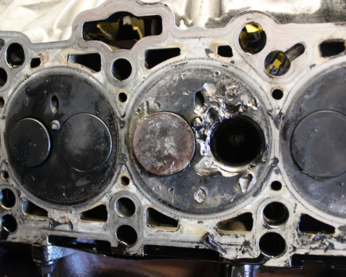 Heavily damaged engine piston