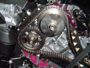 closeup of timing chain on engine