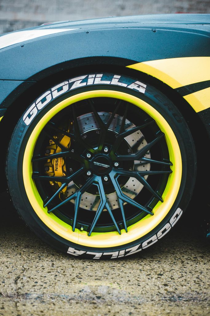 Closeup of a custom wheel on a tuner car.